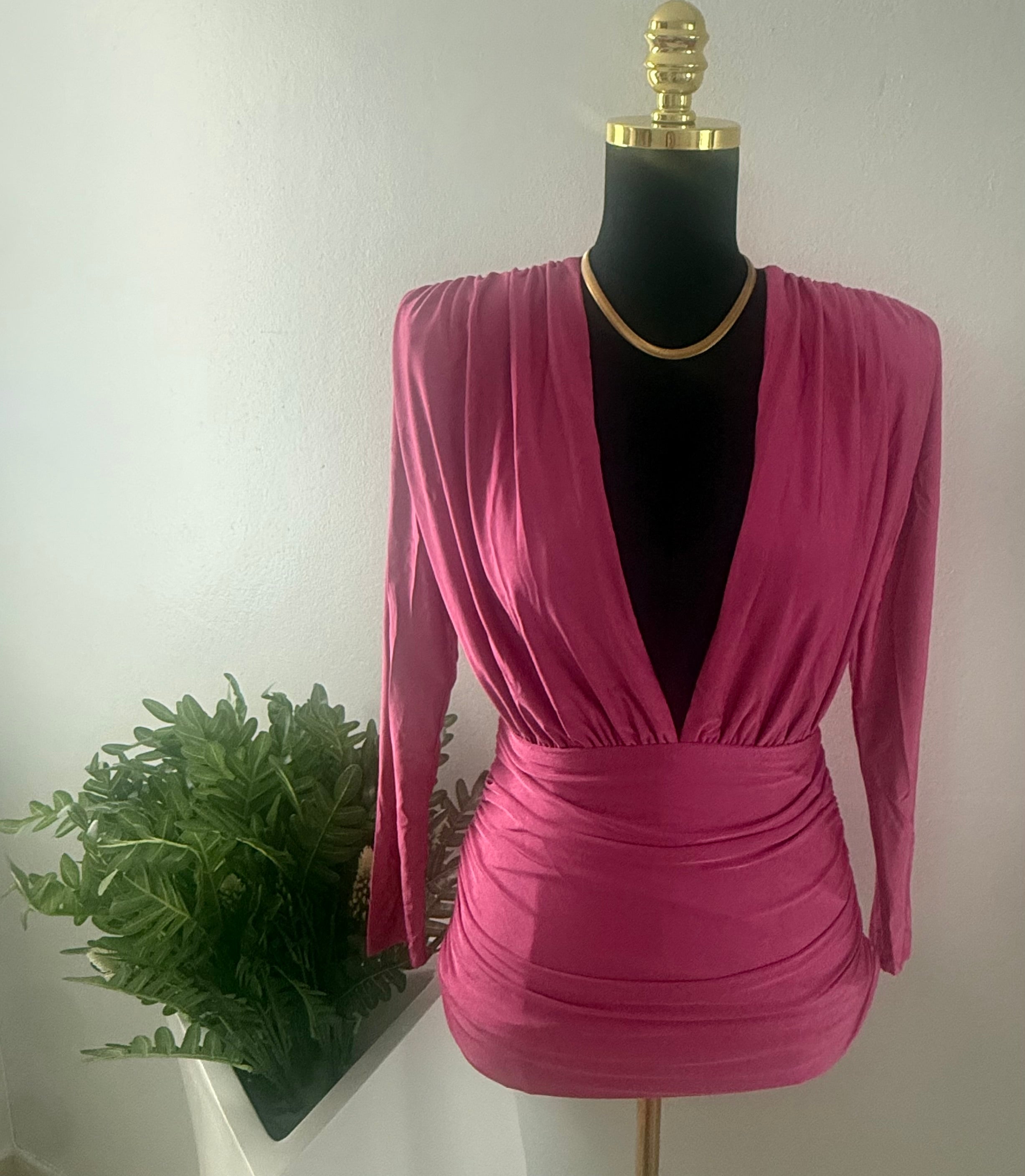 Traje corto rosa